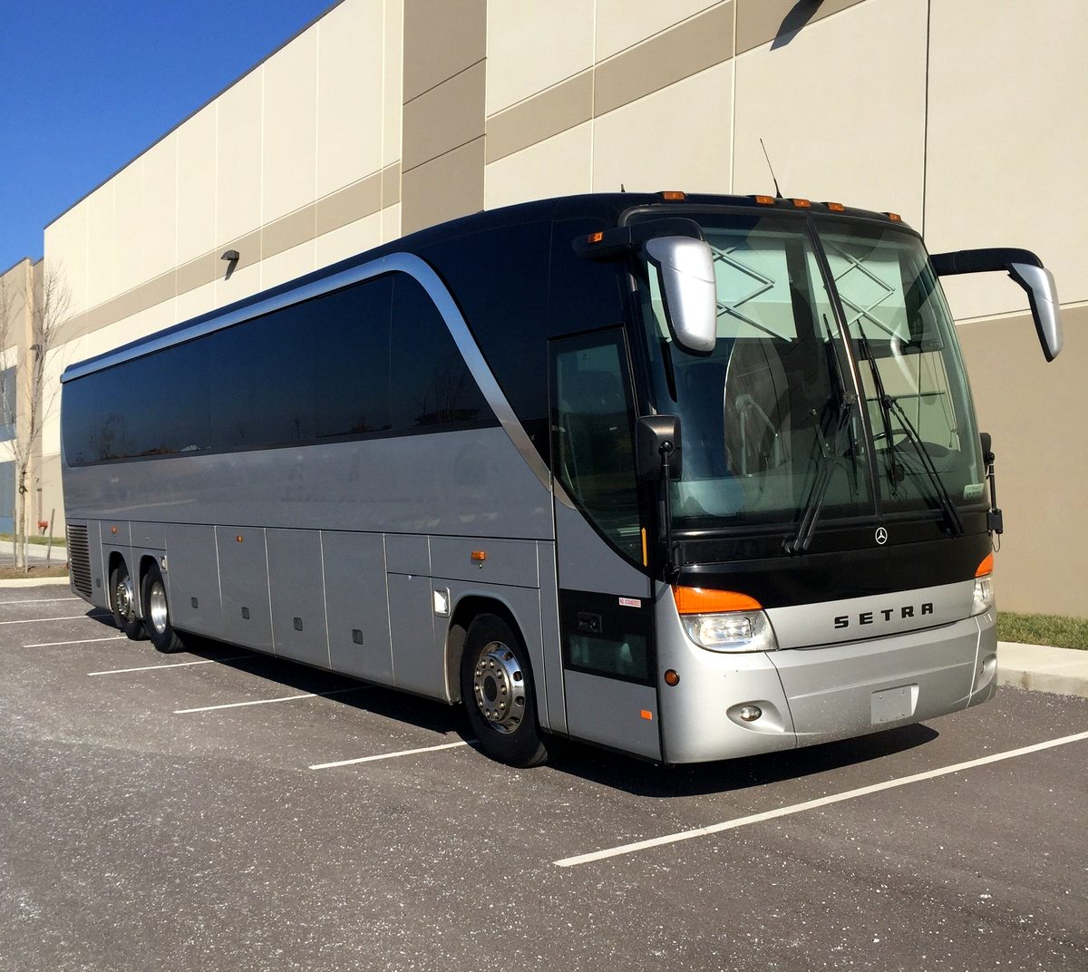 Silver Mercedes-Benz S417 coach, front three-quarter view